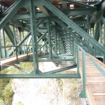 Schlossbachbrücke, Bogenfachwerk aus  Stahl mit Wartungsstegen